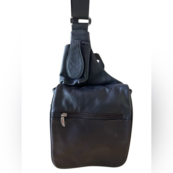 Buxton Handbags - Travelon blue leather anti-theft crossbody bag